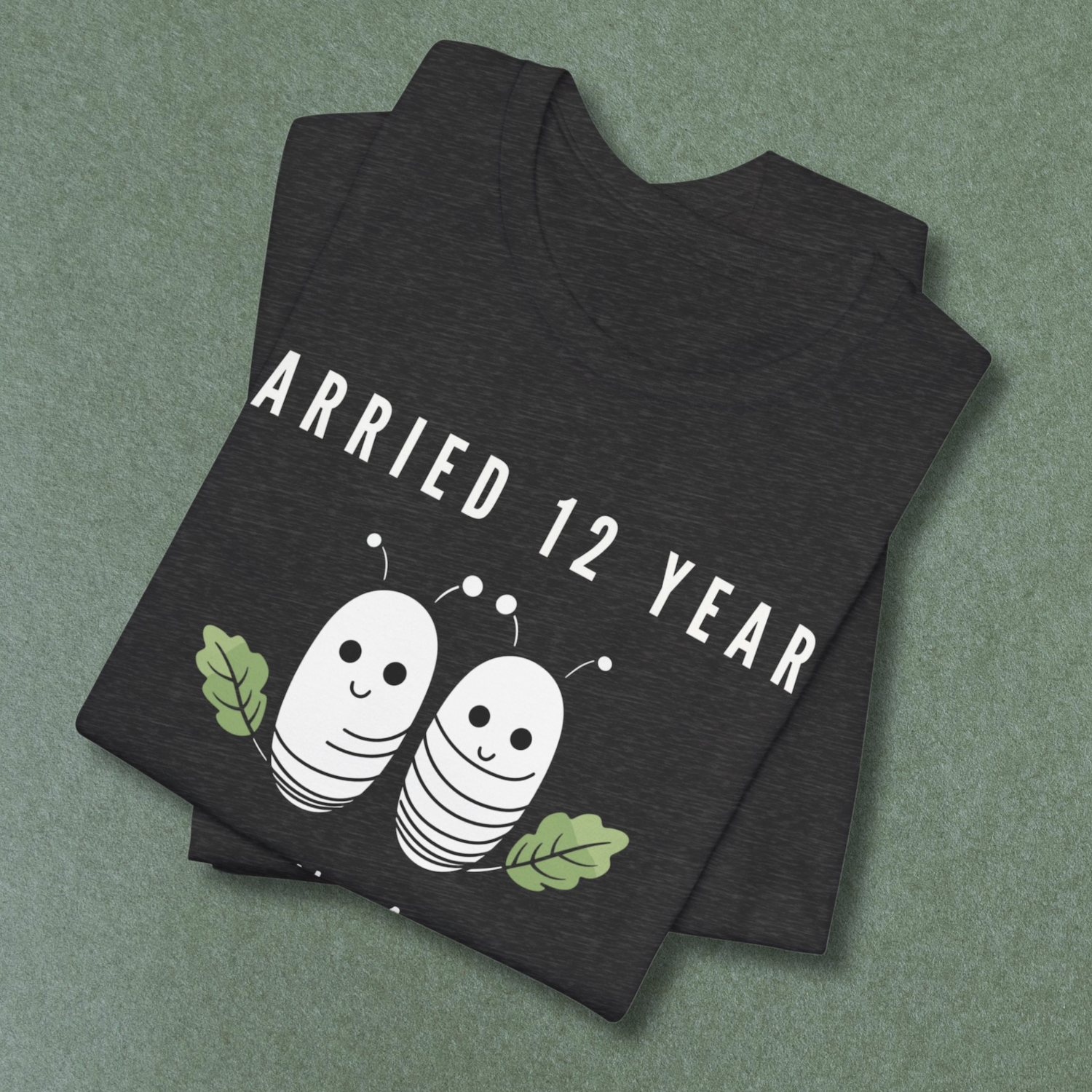 Dark grey anniversary T-shirt with the text Married 12 Years Still Not Silk Of Each Other around two cartoon silkworms