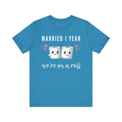 Aqua anniversary t-shirt with the text Married 1 Year We’re on a Roll around two cartoon toilet paper rolls