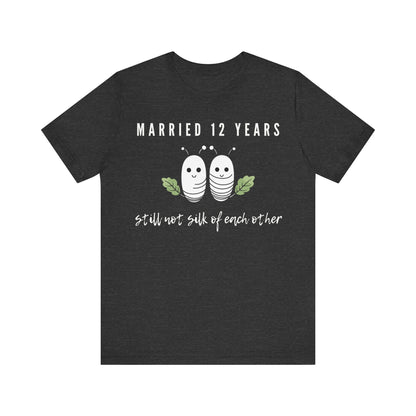 Dark grey anniversary T-shirt with the text Married 12 Years Still Not Silk Of Each Other around two cartoon silkworms