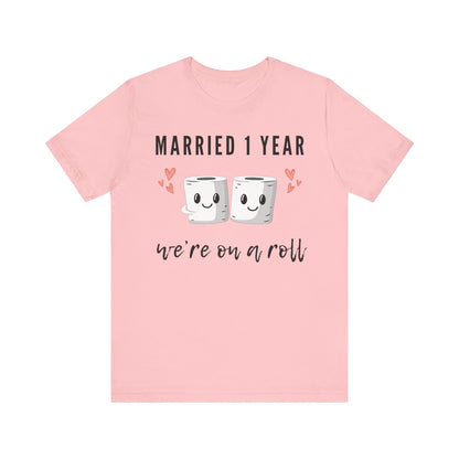 pink anniversary t-shirt with the text Married 1 Year We’re on a Roll around two cartoon toilet paper rolls