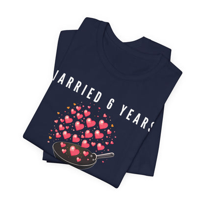 Navy anniversary t-shirt with the text Married 6 Years Still Sizzling around a cartoon frying pan and hearts