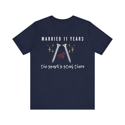 Navy anniversary t-shirt with the text Married 11 Years The Spark’s Steel There around two cartoon screws