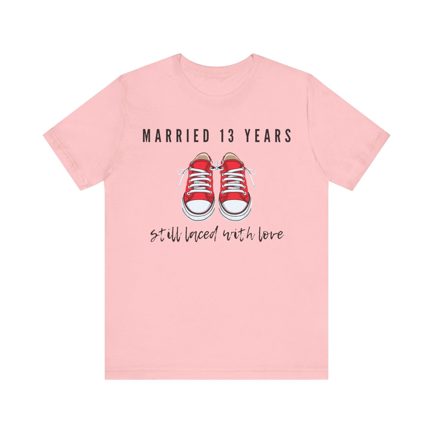 Pink anniversary T-shirt with the text Married 13 Years Still Laced With Love around two cartoon sneakers