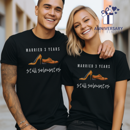 Couple wearing matching anniversary t-shirts with the text Married 3 Years Still Solemates around two cartoon shoes