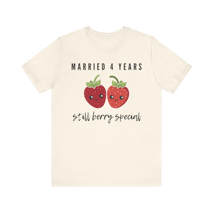 Natural anniversary t-shirt with the text Married 4 Years Still Berry Sweet around two cartoon strawberries